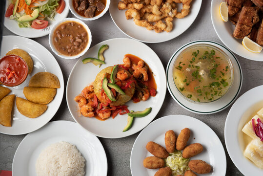Assortment of traditional Caribbean and Dominican dishes on a table