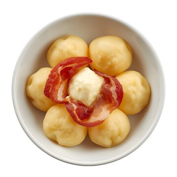 Potato Dumplings topped with Crispy Bacon and Sour Cream served in White Bowl Top View Isolated on White Background