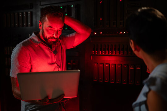 It technician experiencing server emergency in data center