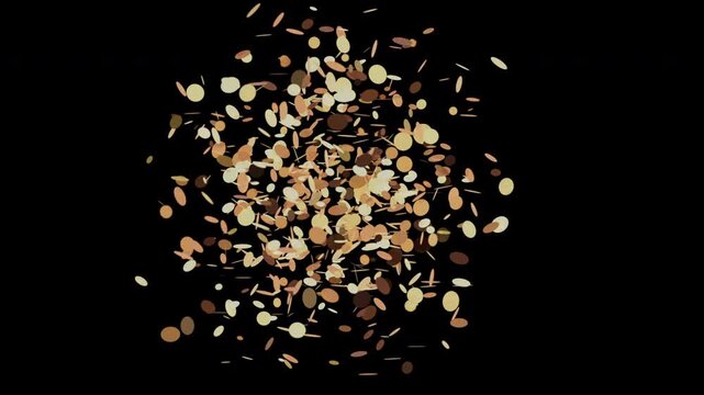 Warm colored confetti particles randomly floating against dark