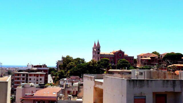Sacrario di Cristo Re across city rooftops, Messina, Sicily, Italy