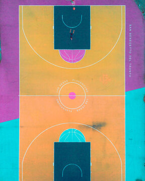Aerial view of a vibrant, multi-colored basketball court with geometric patterns and a player shooting a hoop in San Benedetto del Tronto, Marche, Italy.