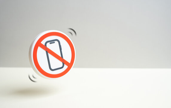 A symbol prohibiting mobile phone use. Fighting distraction and loss of focus. Counter-espionage measures. Security protocols and confidential meeting rules.