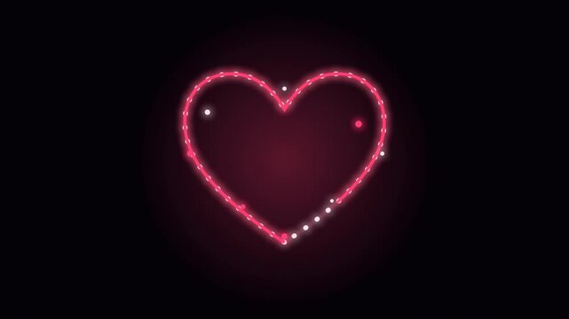 Heart shape outlined with glowing marquee bulbs lighting up on a dark maroon surface