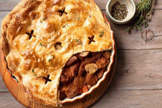 Beef steak and mushroom pie, family meat pie