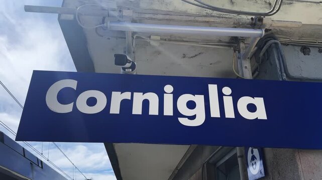 Blue Corniglia Train Station Sign in Bright Daylight in Cinque Terre in Italy