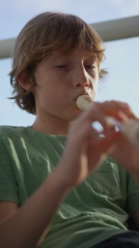 A little boy learns to play the flute at home, practicing with focus and enthusiasm in a cozy, warm setting. A charming scene of early musical exploration, creativity, and childhood growth.