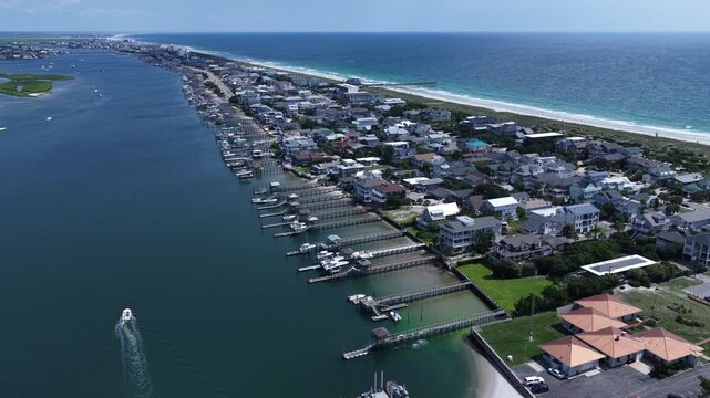 Waterfront homes and rentals at Wrightsville Beach, NC coastline living and vacation destination in summer
