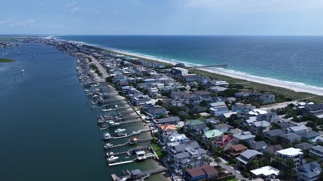 Waterfront homes and rentals at Wrightsville Beach, NC coastline living and vacation destination in summer