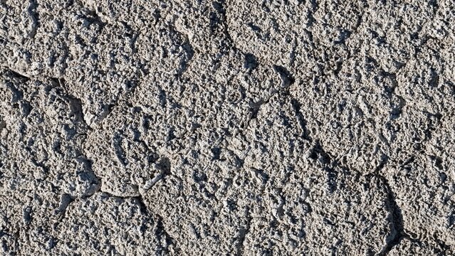 Aerial view of the dry, cracked bed of Little Gaynor Lake showing parched earth and deep fissures in Longmont, Colorado, United States.