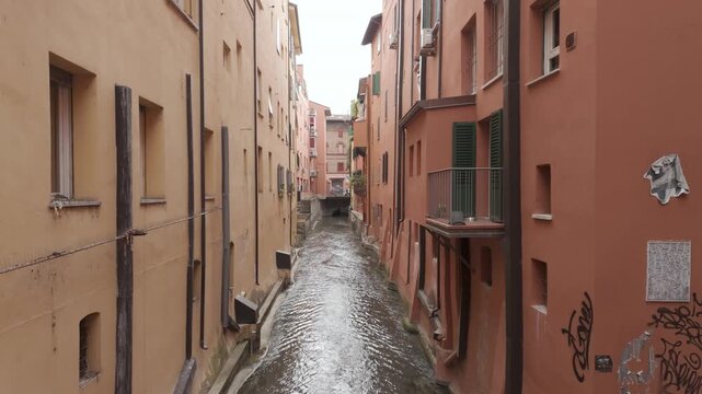 Canale delle Moline flowing between old buildings, Bologna, Italy