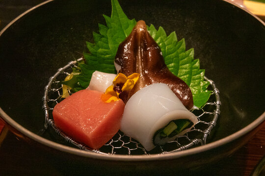 Sashimi platter with tuna and squid served at Takefue ryokan, Aso District, Kumamoto, Japan