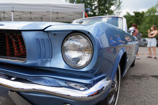 Koprivnice, Czech Republic, Czechia - 31 May, 2026: Ford Mustang 1967. Close-up detail of the headlight of a historic vintage automobile at a retro classic car show. Extremely shallow focus.