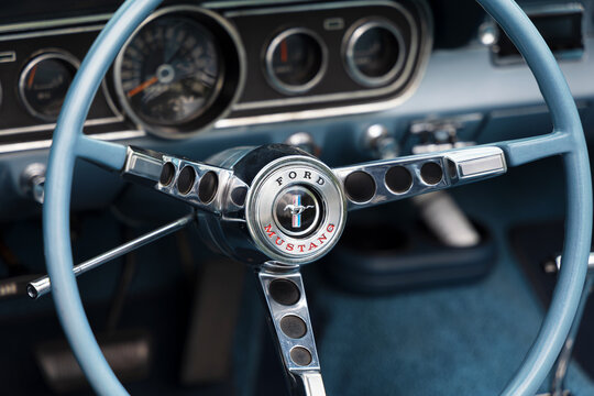 Koprivnice, Czechia - 31 May, 2026: Ford Mustang 1967 - car, auto and automobile detail. Well preserved and maintained classic interior with original interior and steering wheel. Shallow focus	
