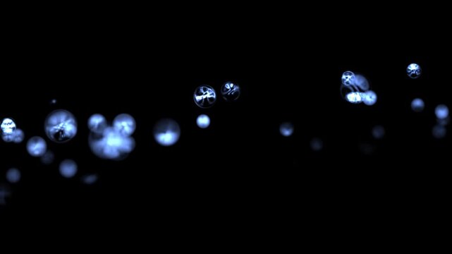 Soft blue bokeh lights floating across a dark background, creating a calm abstract atmosphere with dreamy glow, depth and elegant motion.