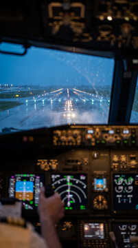 Cockpit Perspective of Aircraft Landing in Rain