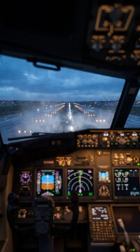 Cockpit View of Airplane Landing on Wet Runway