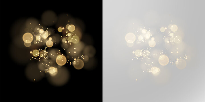 Golden bokeh lights with sparkling particles and soft glowing dust on black background