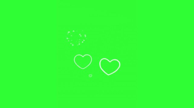 White heart bubble animation that expands and breaks into small glowing fragments on a bright green screen background. 