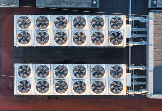 Aerial view of industrial HVAC cooling units on the rooftop of the data centre at Morasko Campus in Poznan, Greater Poland Voivod, Poland.