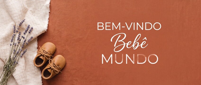 Baby shoes leather flat lay welcome baby arrival background with terracotta fabric lavender sprigs Portuguese text bem vindo bebe mundo newborn birth announcement concept banner copyspace background