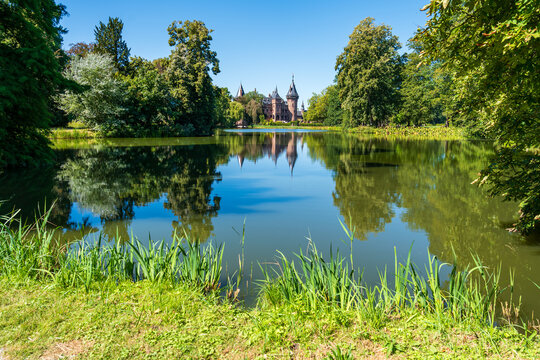 Haar Castle viewed across a pond