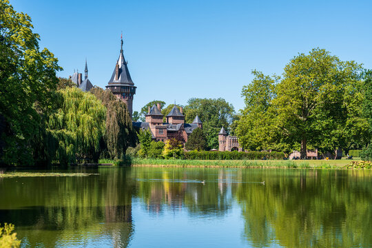 Haar Castle viewed across a lake