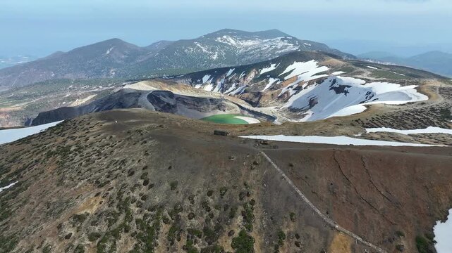 Aerial View of Zao Okama with Distant Coastline at Mt Zao, Yamagata, Japan