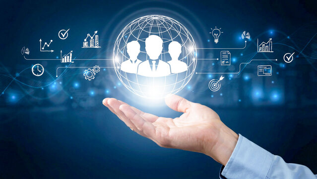 Hand holding a glowing digital network globe with human icons and business data graphics for global networking and technology concepts