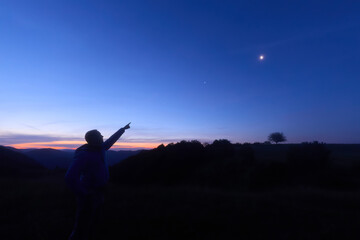 Amateur astronomer observing stars, planets and other celestial objects. © astrosystem