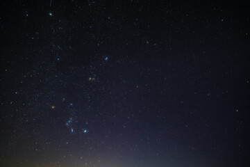 Orion constellation, zodiacal light and Milky Way stars on a dark countryside skies. © astrosystem