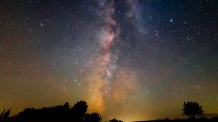 Summer Milky Way stars and landscape scenery silhouettes. © astrosystem