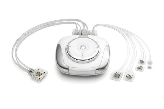 Portable medical nerve stimulation device with connected electrode patches on white background