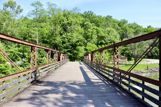 A front view of the old steel bridge in the park.