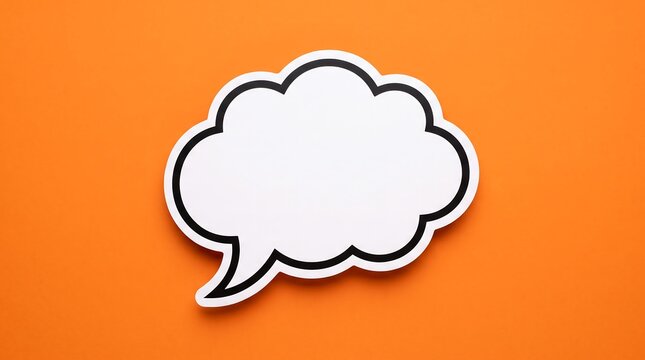 A blank white speech bubble cutout placed on a vibrant orange background perfect for adding custom text or creative messages