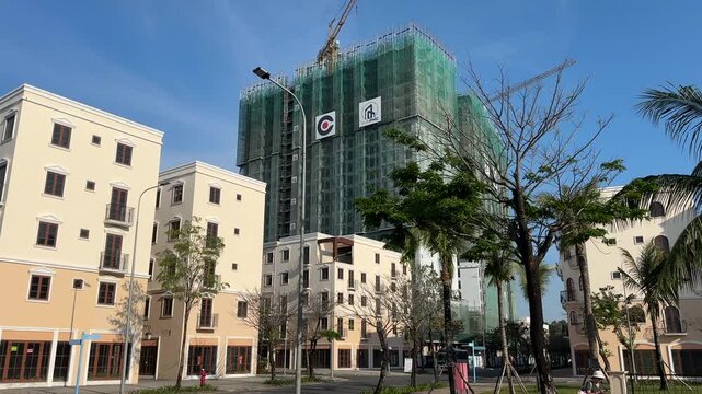 Tower crane on building construction by SUN PMC, Sun Group. Gateway Urban Area - Sun Home 3, high-rise residential complex under construction. Phu Quoc Island, Vietnam, Jan 2, 2026.