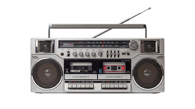 Vintage silver boombox with dual cassette decks. Retro 1980s portable radio ghetto blaster. Classic analog stereo system on white background.