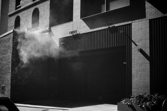 Shadowed Garage Entry with Urban Texture