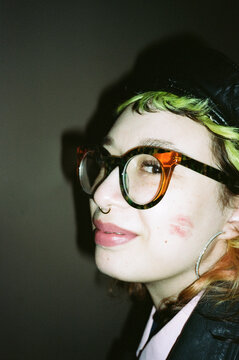 Profile portrait with lipstick kiss on cheek