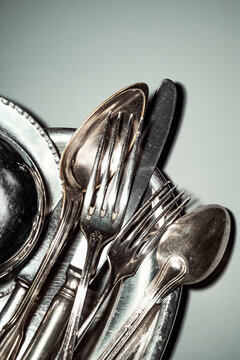 Different Types of Silverware Placed Together on a Tray