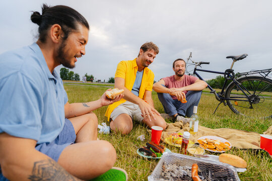 Friends Picnicking at Park