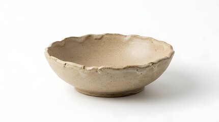 Obraz premium Simple beige ceramic bowl with irregular edges