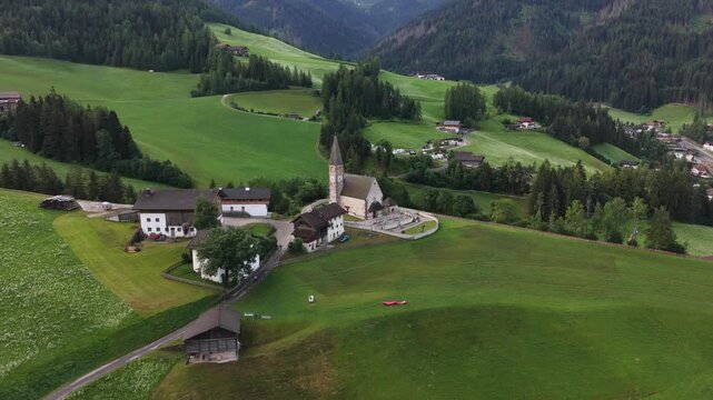 View of Val di Funes with the Chruch of Santa Maddalena in the Dolomites Mountains. UNESCO world heritage in South Tyrol, Italy 