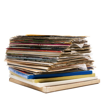 Stack of vintage vinyl records isolated on white background. Collection of old music LPs. Pile of vintage music media.
