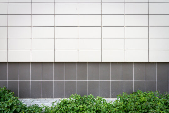 Modern white panel tile wall texture background. Architectural detail.