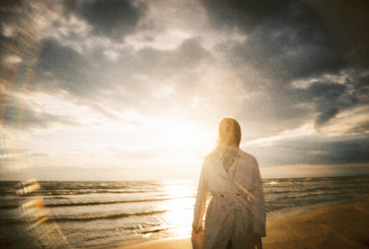 Anonymous Woman at the Beach in Sunset