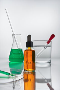 Still Life with Laboratory Glassware and Serum Dropper Bottle.