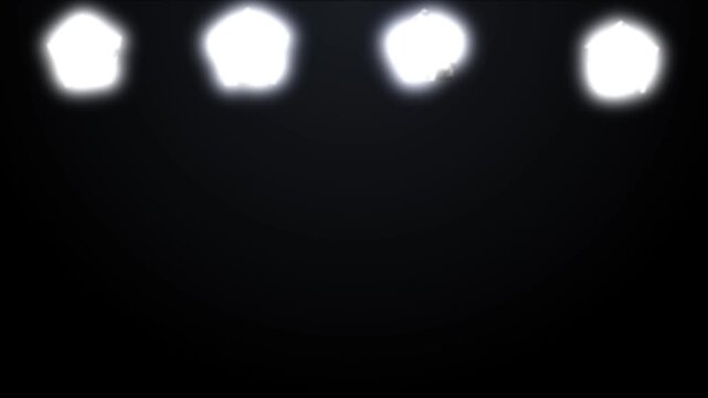 Bright white glowing circular lights array against deep black