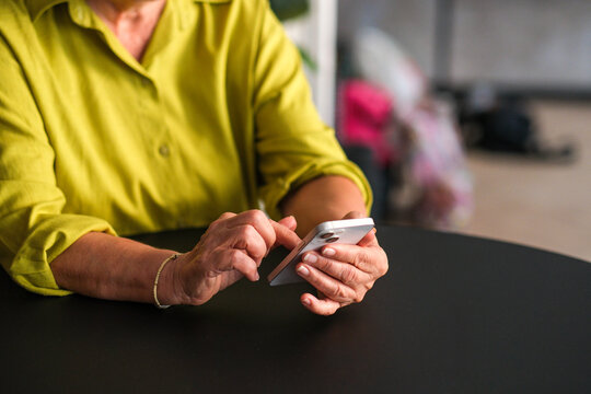 Woman using a smartphone close-up