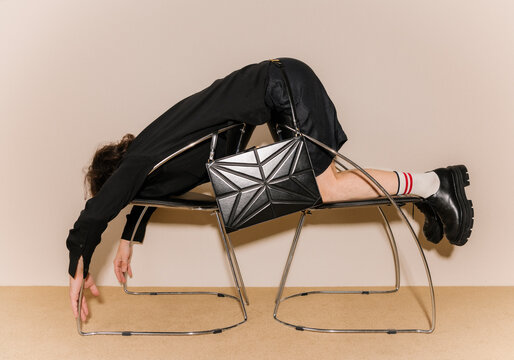 Fashion Editorial Pose With Black Leather Bag